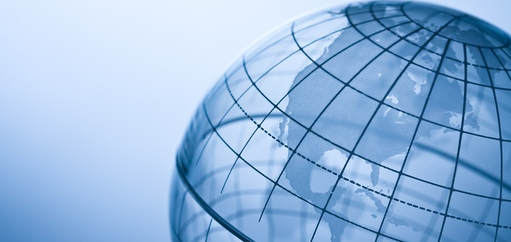 See-through globe with lines of latitude and longitude